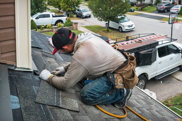 Professional Roofing technician working in Grand Blanc, MI